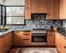 U-Shaped Kitchen Design with Quartz Countertops