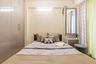 Guest Room With Beige Interiors - Livspace