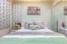 Guest Room With Pastel Green Interiors - Livspace